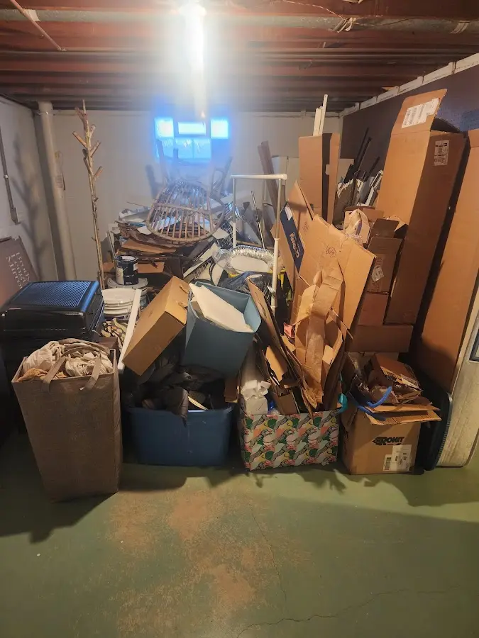 Roll-off dumpster container at job site for Construction Dumpster Rental in Le Ray